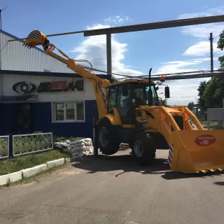 Экскаватор-погрузчик ДЭМ 310
