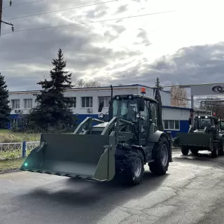 Экскаватор-погрузчик ДЭМ 310