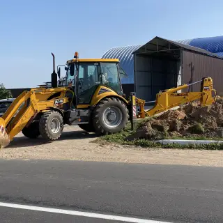 Экскаватор-погрузчик ДЭМ 310