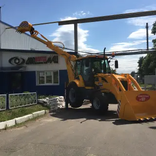 Экскаватор-погрузчик ДЭМ 310