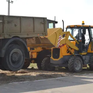Экскаватор-погрузчик ДЭМ 310