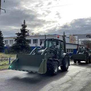 Экскаватор-погрузчик ДЭМ 310