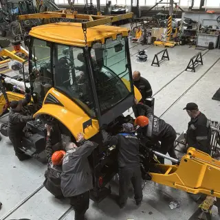 Экскаватор-погрузчик ДЭМ 510 (на равновеликих колесах с крабовым ходом)